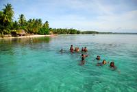 Local_kids_swimming_on_the_Melanesia_Discoverer_with_Tim_Flannery-original